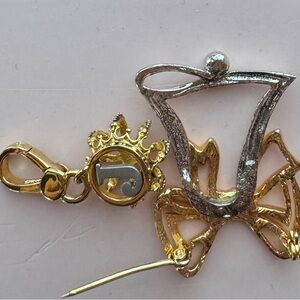 Juicy Couture Crown Charm and gold tone Christmas 
Pin!! Nice!!!